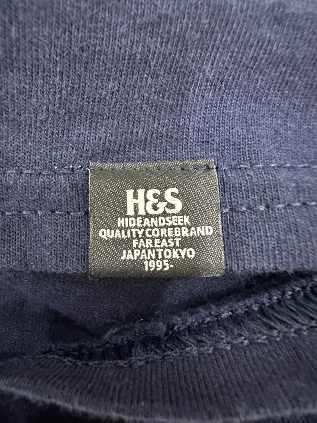 HIDEANDSEEK × Toru Nishiura H&S L/S Tee