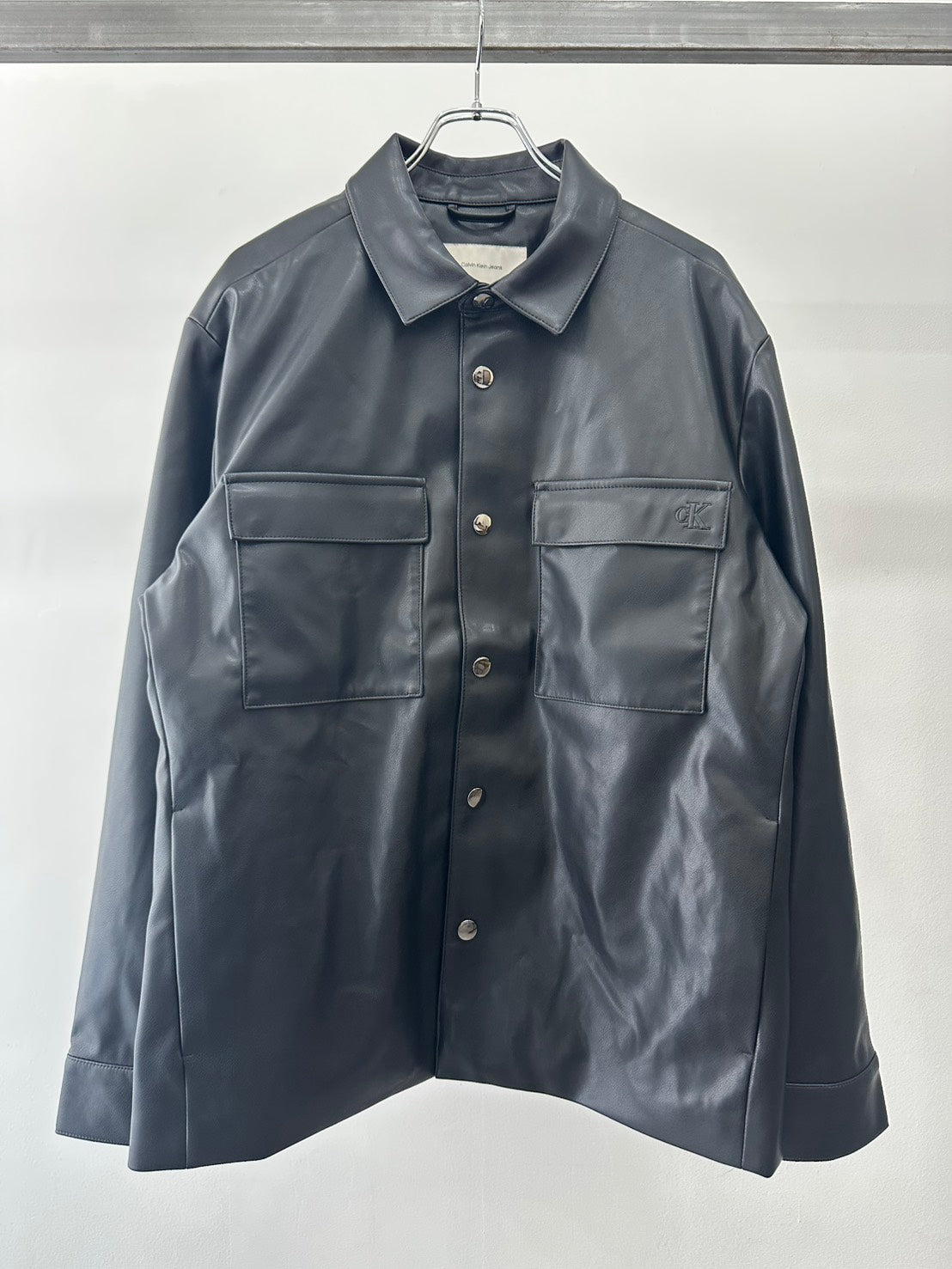 Calvin Klein フェイクレザージャケットブルゾン