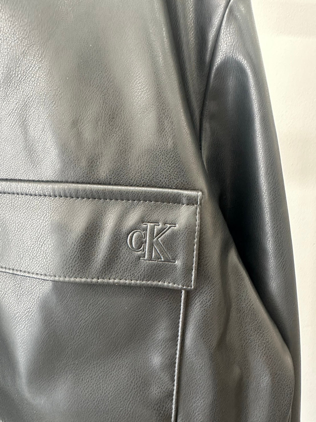 Calvin Klein フェイクレザージャケットブルゾン